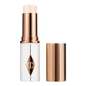CHARLOTTE TILBURY - Unreal Skin Sheer Glow Tint – Hydratační podkladová báze v tyčince